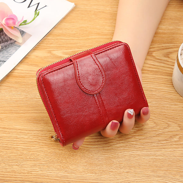2023 new women's short card bag, student cute little fresh zipper, soft leather wallet in hand, 20% off change bag.