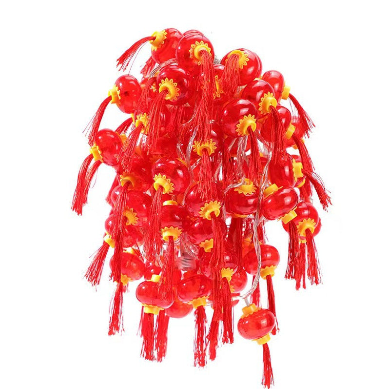 LED lantern string, Chinese New Year lanterns, Spring Festival flashing lights, festive Lantern Festival, New Year's fringed red lanterns