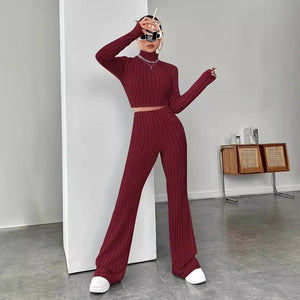 Ready-to-ship european and american cross-border  autumn hot girl knitted turtleneck slim-fit long sleeve top and loose long pants two-piece set