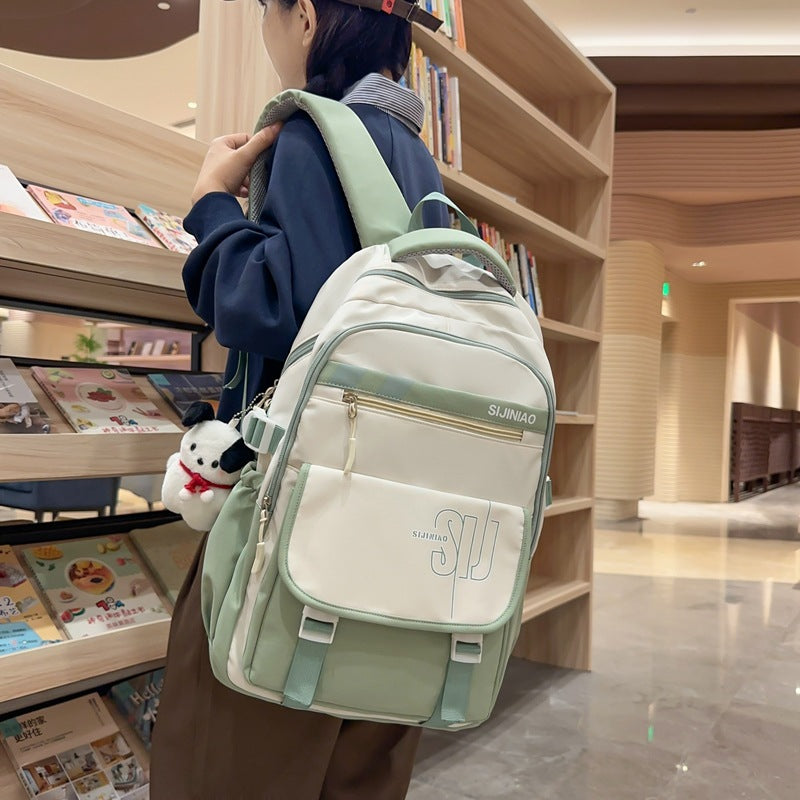 Large-capacity load reduction spine bag for female primary school students, junior high school students, high school students, college students, backpack for women 2023 new models