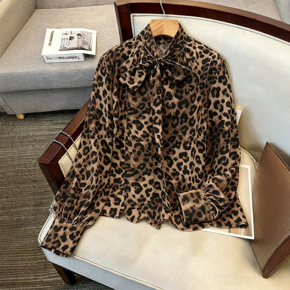Luxury leopard print blouse with tie-waist, stand collar, and lantern sleeves - elegant workwear for women, 1688 source