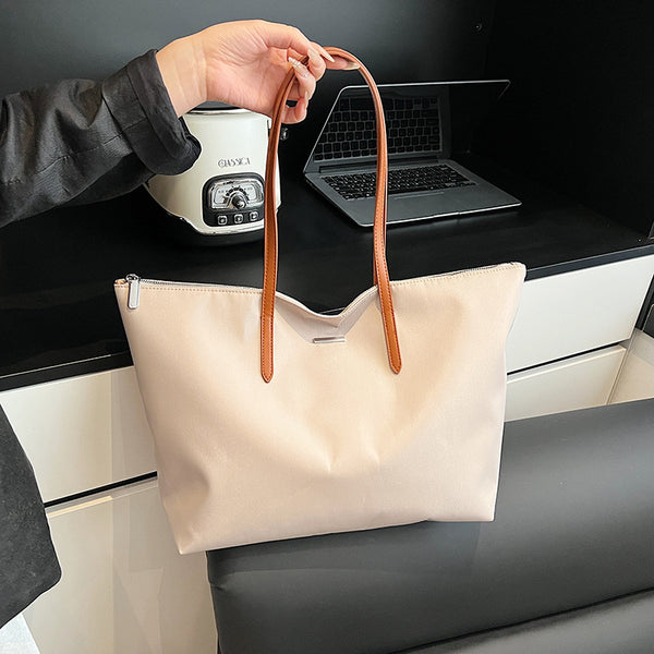 2025 new large-capacity Japanese handbag bag casual women's bag solid color large-capacity handbag women's tote bag