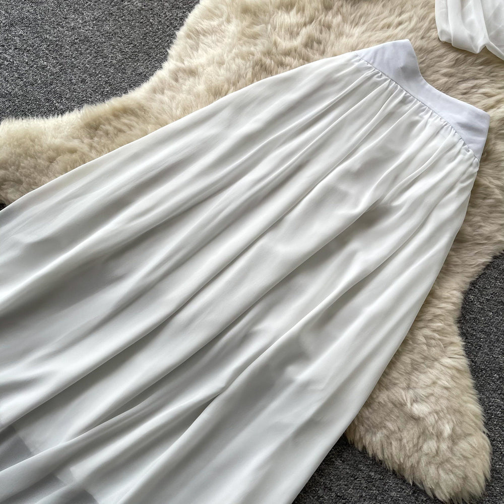 French chic white cropped two-piece set: autumn commute style with a touch of individuality. high-waisted, effortlessly elegant