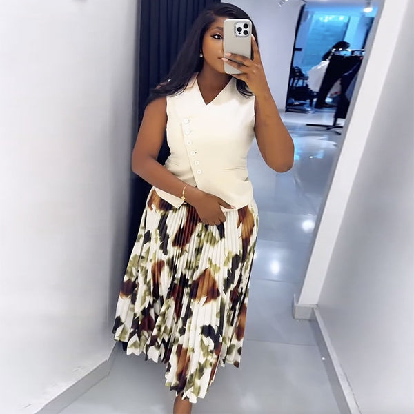 In stock, European and American  women's clothing 2025 summer new V-neck button-down vest top printed pleated long skirt set