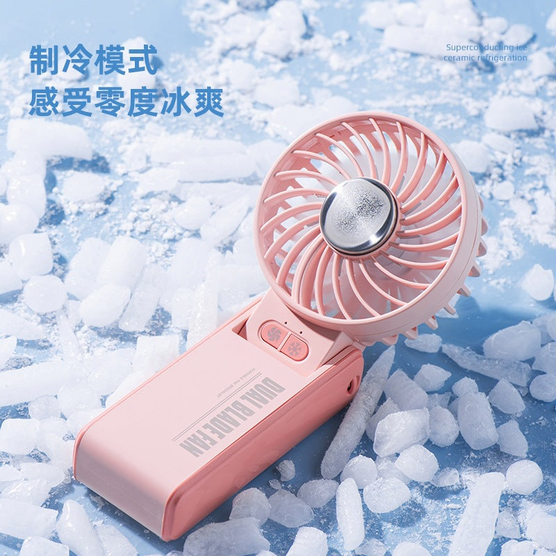 K67 handheld fan, strong wind force, cold compress, foldable color box, various designs, small fan