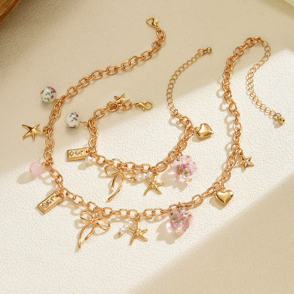 Wholesale bowknot necklaces, cross-border new floral heart pendants, women's niche high-end ceramic bead bracelet accessories