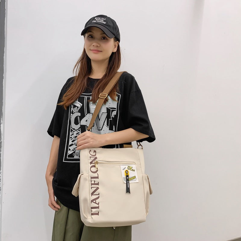 New Japanese large-capacity bag, casual and versatile women's shoulder bag, student class commuting messenger handbag