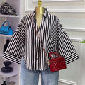 European and american cross-border women's clothing:  summer new arrivals - fashionable, loose-fit, sweet, and designer-inspired striped shirt top with turn-down collar
