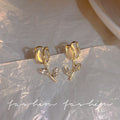 Korean dongdaemun tulip cat's eye stud earrings - unique design, trendy & ethereal, high-end earrings for women