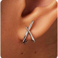 European and american cross-border fashion stone and gold earrings, versatile criss-cross studs, new women's cubic elegance trendy jewelry