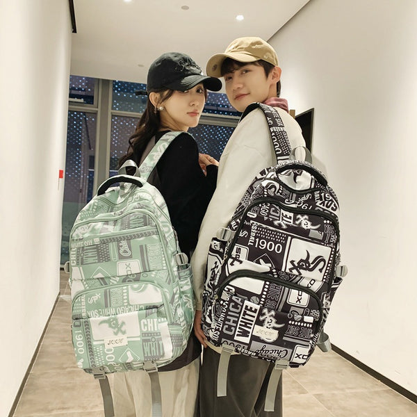 New large-capacity Korean version of middle school students, junior high school backpacks, men's fashion trend graffiti schoolbags, women's strong backpacks