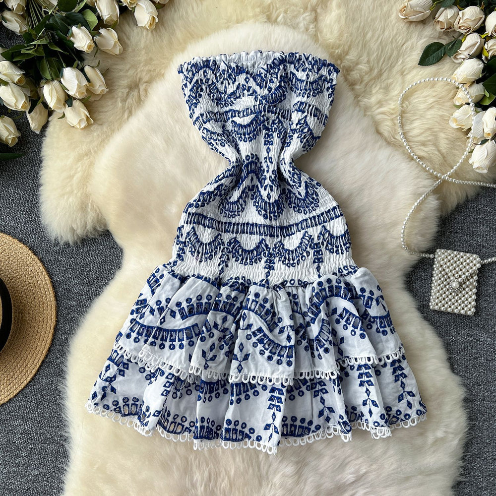 New women's vacation dress: designer ruched sleeveless bandeau dress with cinched waist, slimming cutout embroidery, and ruffle hem