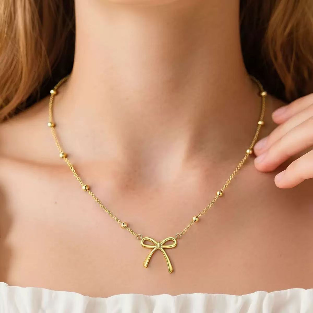 amazon hot-selling fashionable minimalist bow pendant necklace for women, stainless steel light luxury clavicle chain