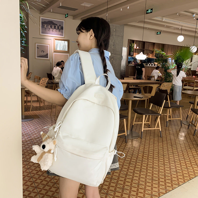 Japanese-inspired, effortlessly chic backpack. new, sweet, solid-color design for elementary school students. a fresh, versatile, lightweight backpack perfect for school