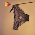 lingerie factory: low-rise, sexy women's panties featuring bow accents, lace detailing, and a breathable, criss-cross design. women's briefs