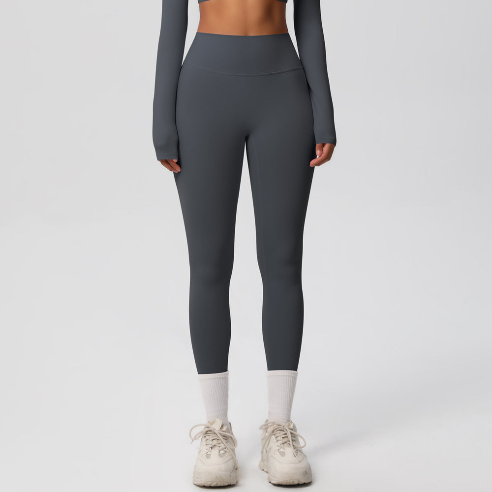 High-waisted, brushed nylon yoga pants with a cloud-like feel, designed for outdoor sports. these compression leggings are quick-drying and perfect for running and fitness. custom manufacturing available