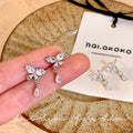 Japanese and korean silver sparkling zircon butterfly teardrop stud earrings - women's unique, elegant, and high-end style - 2026 new hot seller