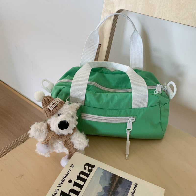 Foreign trade Japanese light casual nylon cloth portable small bag women's 2025 new shoulder messenger bag bowling bag