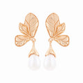 European and american cross-border sweet alloy enamel flower earrings - women's stylish, versatile, vacation-inspired leaf stud earrings wholesale