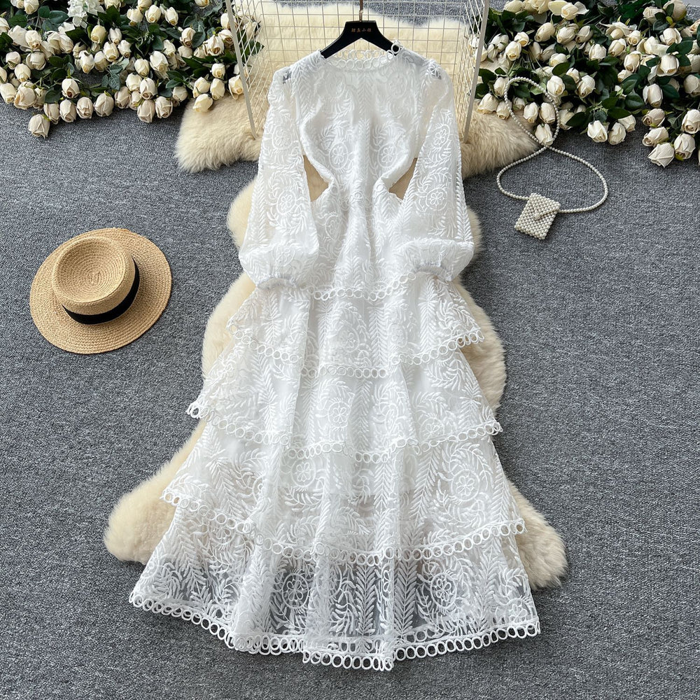 French chic high-end elegant dress for women, autumn  collection: luxurious, heavily embroidered, cinched waist, ruffle hem, tiered maxi dress