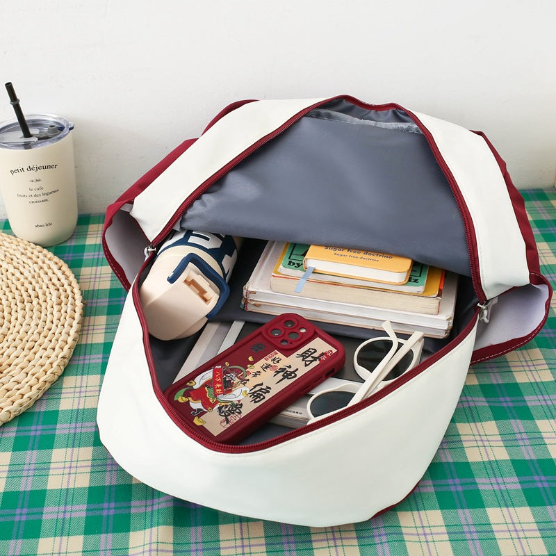 Cross-border customized schoolbag women's 2025 new fashion backpack, primary and secondary school student bag, large-capacity four-piece schoolbag