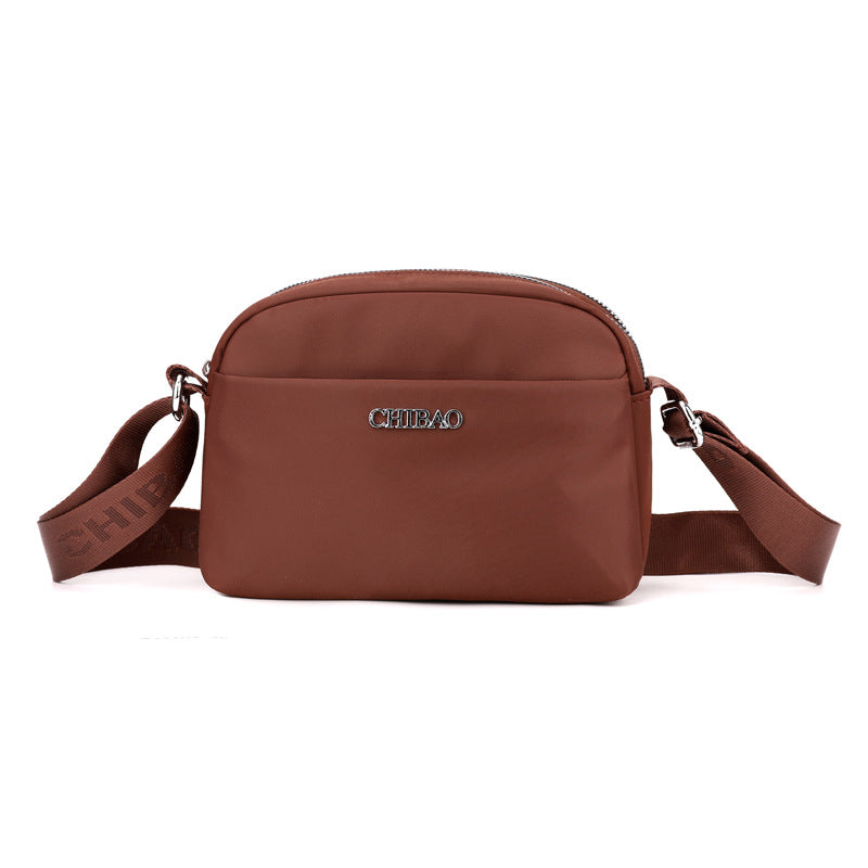 Foreign trade new lightweight messenger bag bag women's solid color simple nylon cloth casual shoulder bag portable commuter small square bag