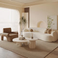 Curved, uniquely shaped, cream-toned sofa – a creative and sophisticated addition to clothing stores, beauty salons, office break rooms, and reception areas