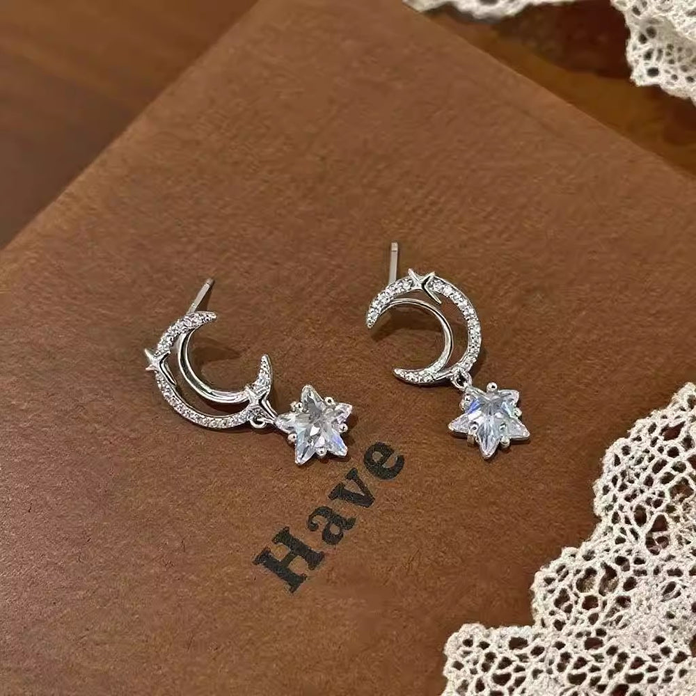 2026 new arrival: trendy silver star pendant moon earrings - women's unique, fashionable, exquisite, and versatile earrings wholesale