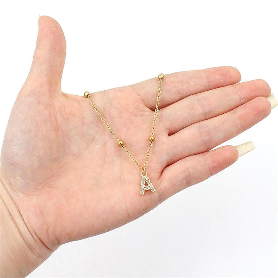 Fashion cross-border accessible luxury diamond-encrusted 26-letter necklace fashion copper micro-paved zircon pendant stainless steel ball necklace