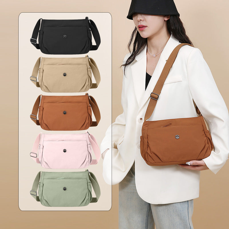 Simple new solid color shoulder bag women's light casual versatile outdoor small square bag fashionable commuter pleated messenger bag