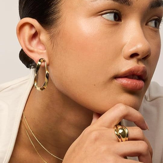 Brass electroplated real gold cross-border women's 14k wave-shaped stylish pendant earrings lightweight twisted infinite ring