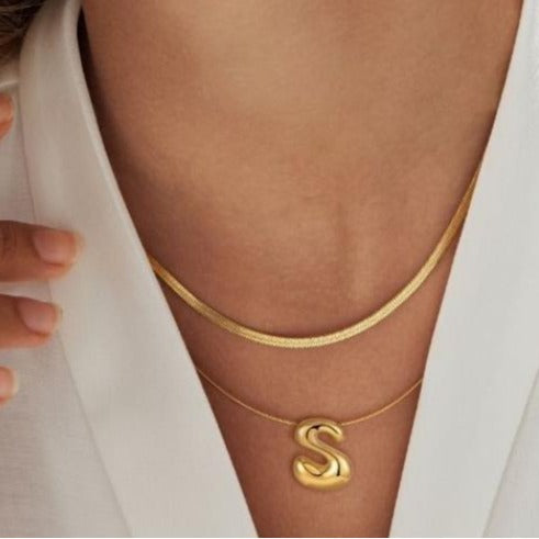 Amazon bestseller: premium bubble 26-letter gold pearlized necklace pendant - stylish women's accessory