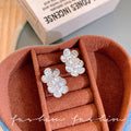 Micro-paved zirconia flower stud earrings - trendy, chic, and effortlessly elegant. a versatile and minimalist accessory for women