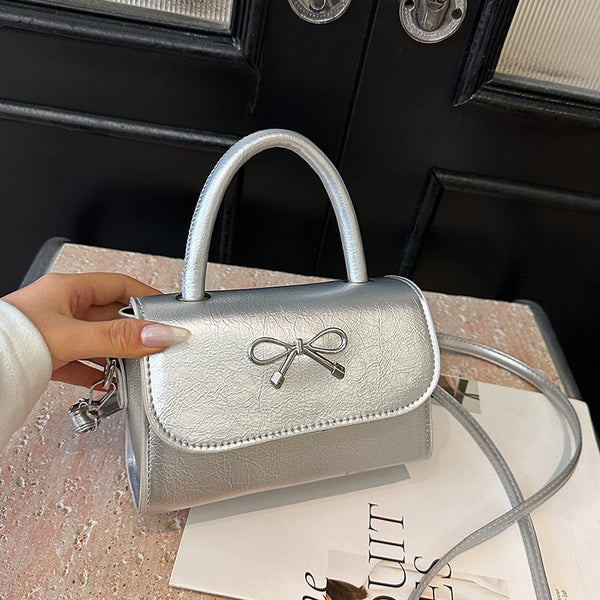 Pink portable bow bag women's 2025 new summer shoulder messenger bag niche fashion cute small square bag