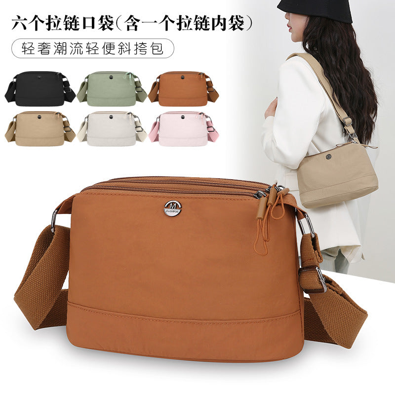 Simple casual nylon messenger bag women's  new lightweight shoulder bag multi-layer storage Korean version of foreign style small square bag