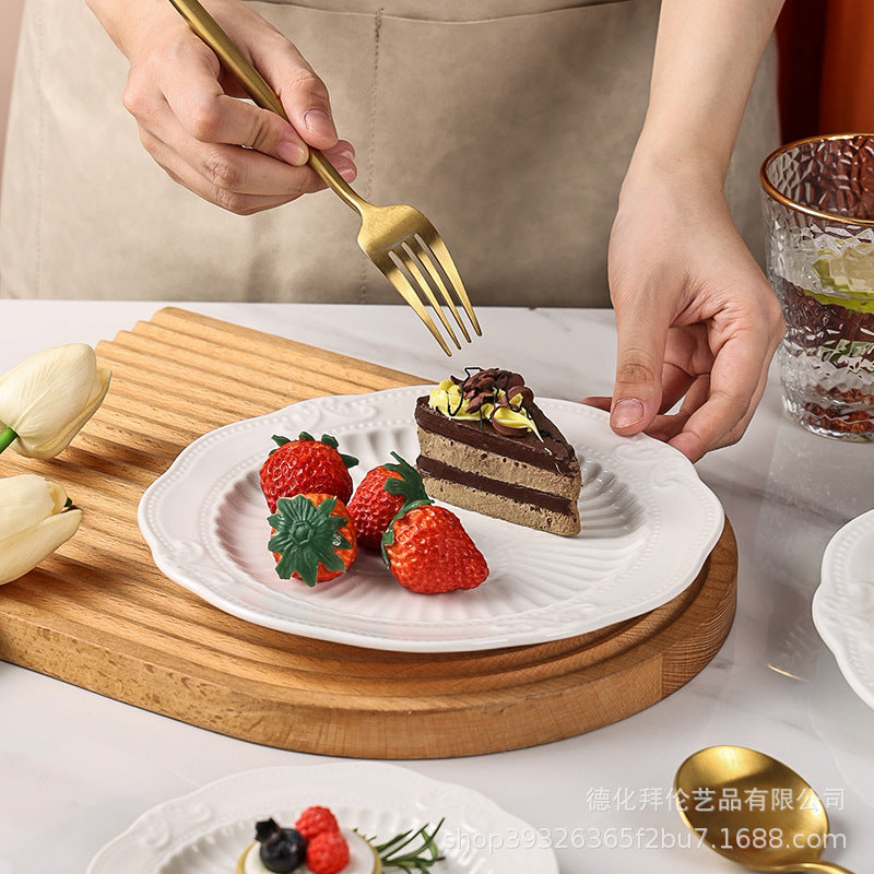 European-style pure white dessert plate, three-tier fruit platter, modern showroom display, creative embossed ceramic plate wholesale