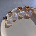 Wholesale heart earrings: european & american cross-border fashion jewelry, versatile alloy dangle earrings, niche & affordable luxury acrylic stud earrings for women