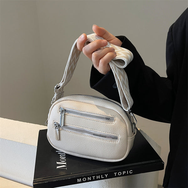 Women's breast bag 2025 autumn and winter new retro double zipper fanny pack street messenger bag trendy women's shoulder bag.