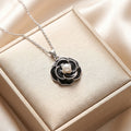 8442 pearl black camellia steel necklace
