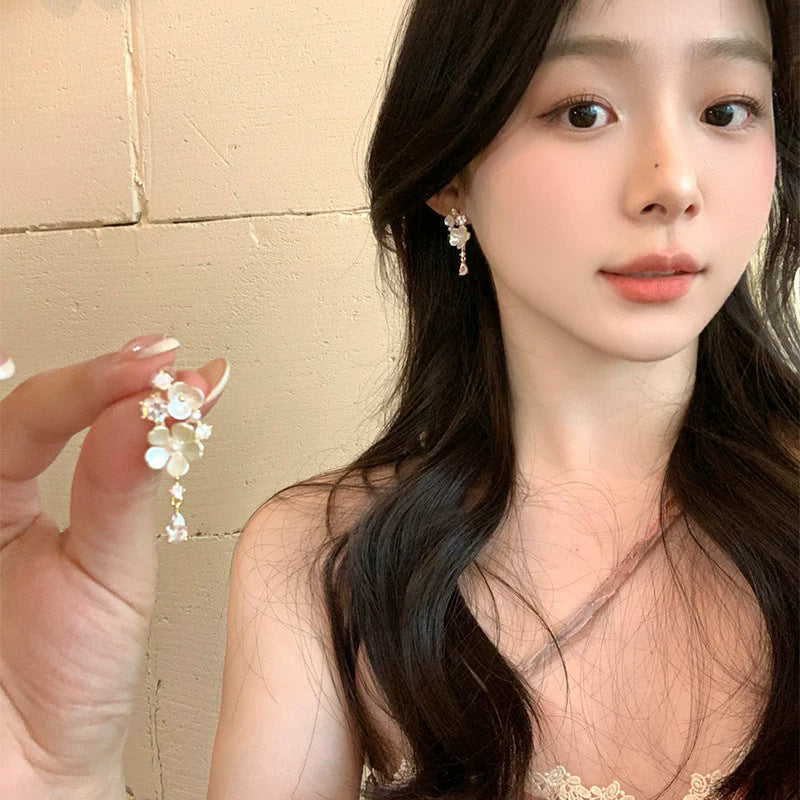 French-style cubic zirconia flower tassel earrings - women's luxury, high-end, and exquisite stud earrings. ethereal, trendy, and chic