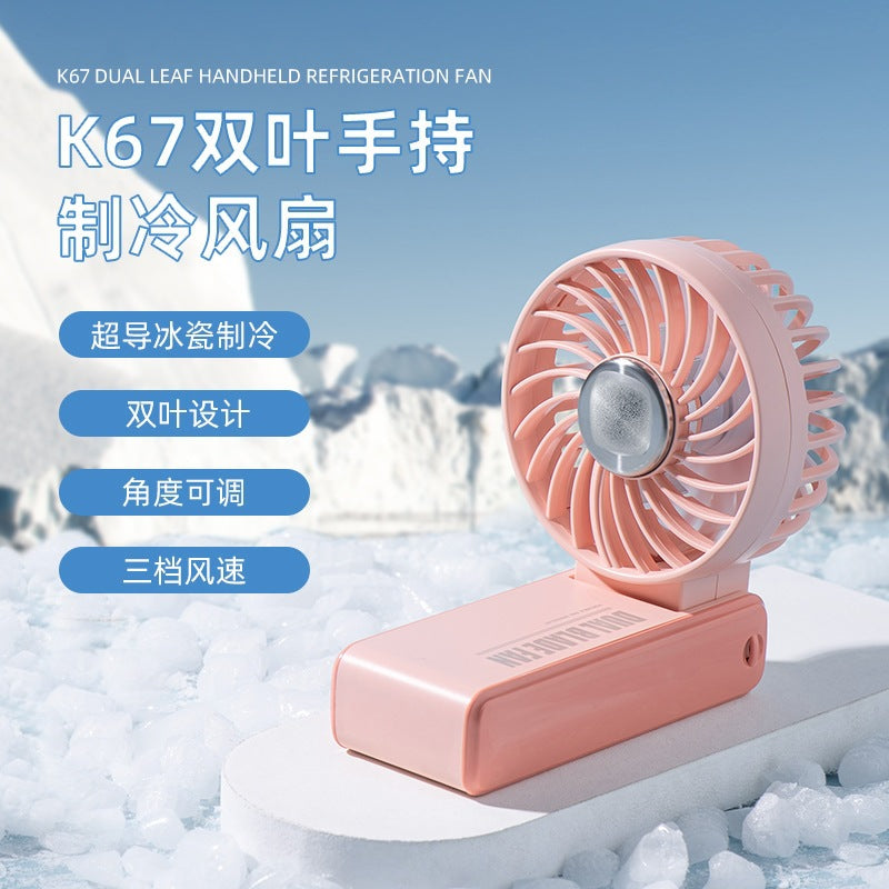 K67 handheld fan, strong wind force, cold compress, foldable color box, various designs, small fan