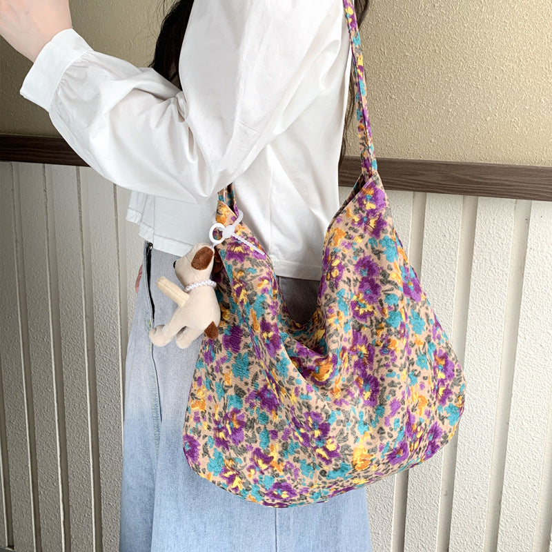 Cross-border new broken flower canvas bag messenger bag shopping bag fashion trend large capacity casual versatile women's shoulder bag