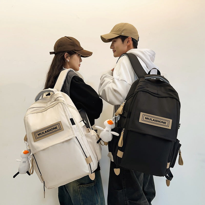New large-capacity backpack, male and female college students with the same schoolbag, junior high school high school students travel business computer backpack