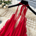Beach vacation dress women's summer dress sense of design v neck halter suspender backless slit chiffon beach skirt long skirt
