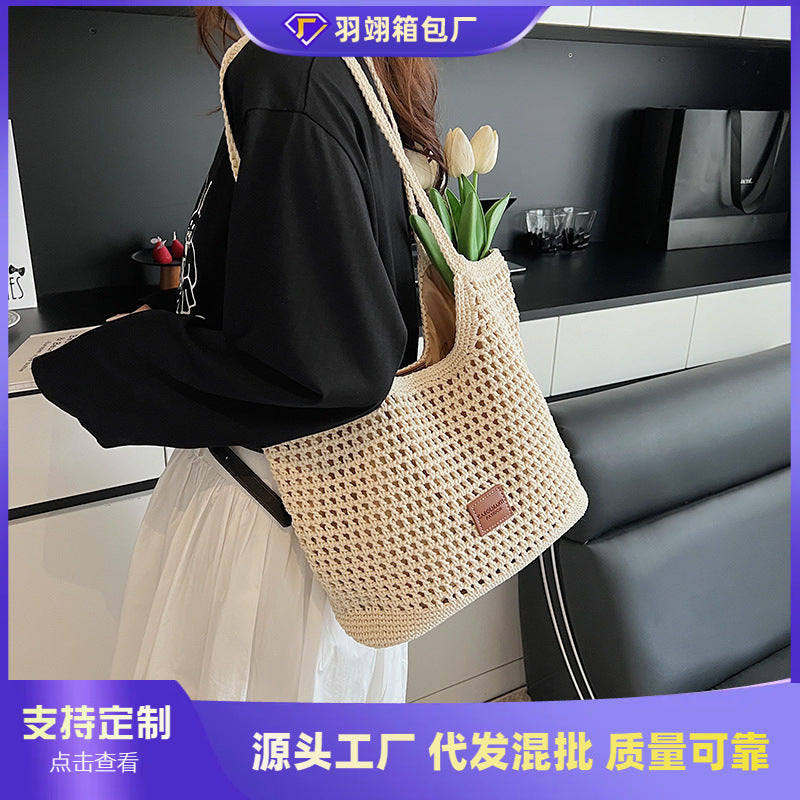 Cross-border commuting large-capacity hollow woven bag women's 2025 new versatile shoulder bag casual knitted tote bag