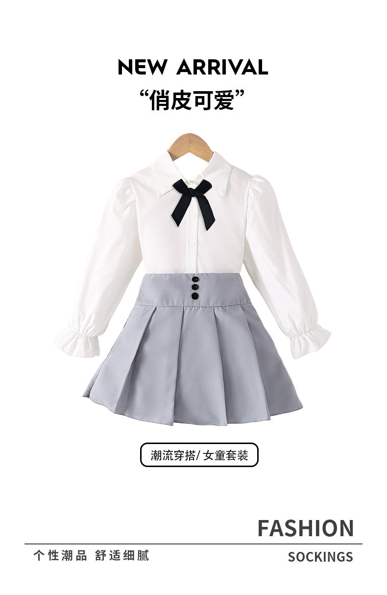 Girls' foreign trade skirt set: white long-sleeve blouse with bow tie, high-waisted pleated skirt, preppy style children's outfit