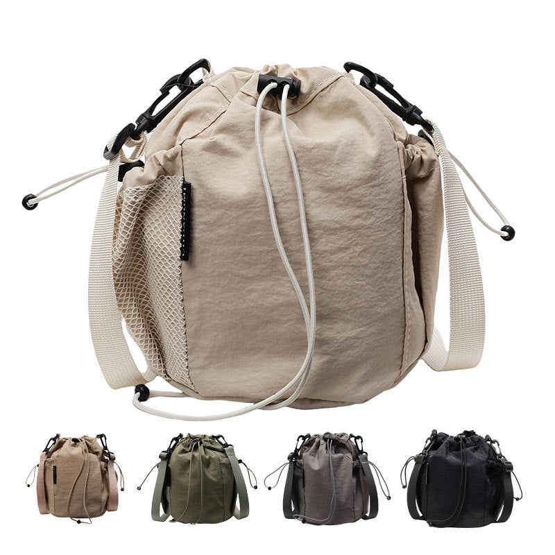 New drawstring bundle hand carry bucket bag  simple casual versatile shoulder bag outdoor commuter messenger women's bag