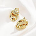 European and american cross-border amazon design new twisted knotted earrings oval hollow copper tube metal drop earrings jewelry