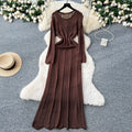 Gentle wind niche styleclassy round neck long sleevescut outknittingdress women's inner suspender skirt layered two-piece set