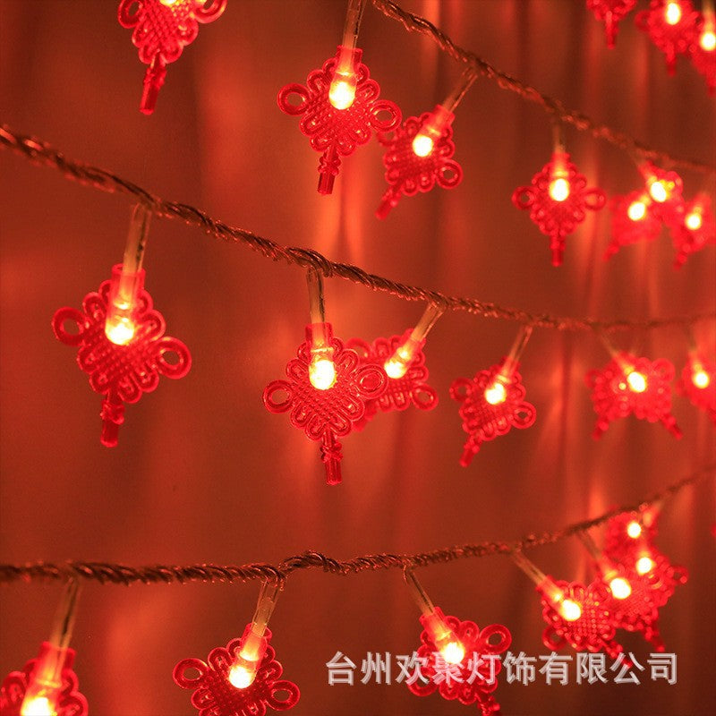 LED lantern string, Chinese New Year lanterns, Spring Festival flashing lights, festive Lantern Festival, New Year's fringed red lanterns
